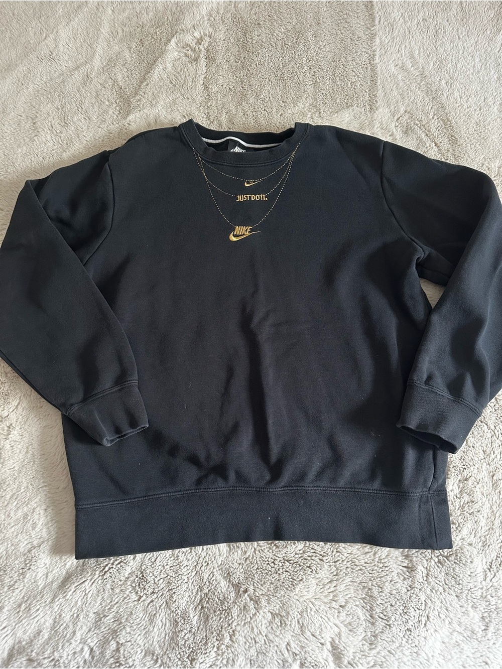 Nike Black Crewneck Sweatshirt with Gold Swoosh and Accents